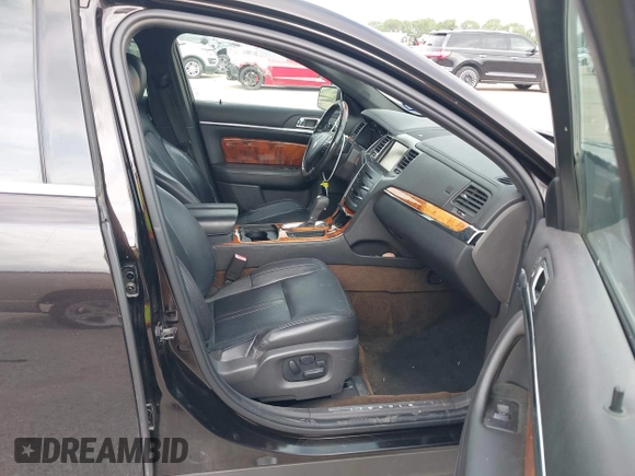 2013 Lincoln MKS with VIN 1LNHL9DK1DG608872, listed as a IAAI auction lot 42672243 with 175,935 mi miles and . Bid and sale history available at DreamBid. Image 5.