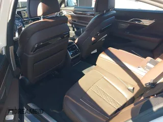 2017 BMW 7 Series 750i with VIN WBA7F0C34HGM21738, listed as a IAAI auction lot 41772933 with 62,923 mi miles and . Bid and sale history available at carsss.com. Image 8.