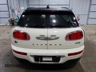 2017 MINI Clubman Cooper with VIN WMWLU1C57H2F27158, listed as a Copart auction lot 77672744 with 73,850 mi miles and Salvage Title. Bid and sale history available at carsss.com. Image 6.