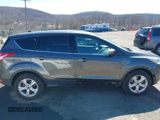 2016 Ford Escape SE with VIN 1FMCU9GX7GUA58243, listed as a IAAI auction lot 41856764 with 50,129 mi miles and . Bid and sale history available at DreamBid. Image 14.