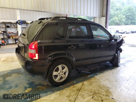 2005 Hyundai Tucson GL with VIN KM8JM12BX5U205060, listed as a Copart auction lot 71282644 with 243,076 mi miles and Salvage Title. Bid and sale history available at carsss.com. Image 3.