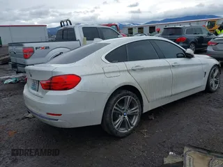 2016 BMW 4 Series 428i xDrive with VIN WBA4C9C54GG135615, listed as a IAAI auction lot 41655368 with 156,851 mi miles and . Bid and sale history available at carsss.com. Image 4.