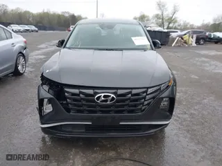 2022 Hyundai Tucson SE with VIN 5NMJA3AE1NH003932, listed as a IAAI auction lot 40517267 with 60,740 mi miles. Bid and sale history available at carsss.com. Image 12.