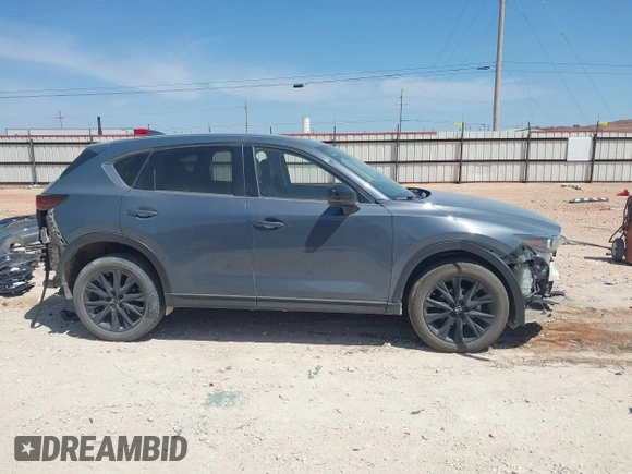 2023 Mazda CX-5 S Carbon Edition z VIN JM3KFBCM7P0164462, wystawiony jako IAAI lot #41919579 z przebiegiem 49 585 mil mil oraz . Historia ofert i sprzedaży dostępna na DreamBid. Obrazek 14.