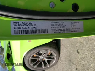 2023 Dodge Challenger R/T Scat Pack Widebody z VIN 2C3CDZFJXPH528189, wystawiony jako Copart lot #87296994 z przebiegiem 53 679 mil mil oraz Szkoda całkowita • Salvage title. Historia ofert i sprzedaży dostępna na DreamBid. Obrazek 12.
