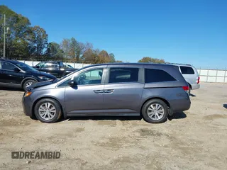 2016 Honda Odyssey EX-L with VIN 5FNRL5H69GB047902, listed as a IAAI auction lot 40795564 with 124,788 mi miles. Bid and sale history available at carsss.com. Image 14.