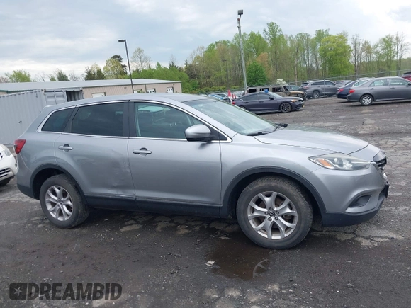 2015 Mazda CX-9 Sport with VIN JM3TB3BV2F0454770, listed as a IAAI auction lot 42009879 with 98,916 mi miles and . Bid and sale history available at carsss.com. Image 13.