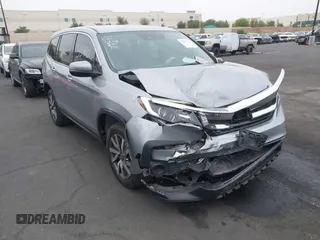 2021 Honda Pilot EX with VIN 5FNYF5H3XMB007140, listed as a IAAI auction lot 42433410 with 68,513 mi miles and . Bid and sale history available at DreamBid. Image 1.