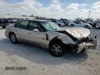 1999 Pontiac Bonneville SE z VIN 1G2HX52K8XH242092, wystawiony jako Copart lot #46260935 z przebiegiem 165 377 mil mil oraz Szkoda całkowita • Salvage title. Historia ofert i sprzedaży dostępna na DreamBid. Obrazek 11.