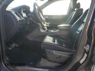 2019 Jeep Grand Cherokee Overland with VIN 1C4RJFCG3KC577784, listed as a Copart auction lot 49412955 with 79,450 mi miles and Salvage Title. Bid and sale history available at carsss.com. Image 7.