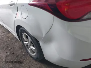 2015 Hyundai Elantra SE z VIN 5NPDH4AE2FH573747, wystawiony jako IAAI lot #42130009 z przebiegiem 99 220 mil mil oraz . Historia ofert i sprzedaży dostępna na DreamBid. Obrazek 11.