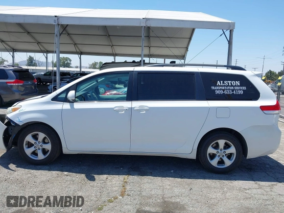 2011 Toyota Sienna LE AAS with VIN 5TDKK3DC3BS164612, listed as a IAAI auction lot 42302123 with 165,941 mi miles and . Bid and sale history available at DreamBid. Image 14.