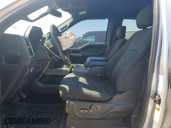 2018 Ford F-150 XL with VIN 1FTEW1CGXJFB40297, listed as a Copart auction lot 69642404 with 92,561 mi miles and Salvage title. Bid and sale history available at DreamBid. Image 7.