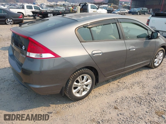 2010 Honda Insight EX with VIN JHMZE2H75AS027964, listed as a IAAI auction lot 41889301 with 136,485 mi miles and . Bid and sale history available at DreamBid. Image 4.