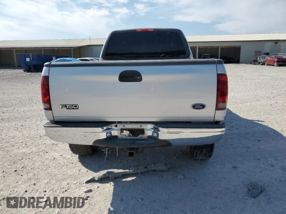 2000 Ford F-150 XL with VIN 1FTRX18L8YNB58706, listed as a Copart auction lot 53243215 with 0 mi miles and Salvage Title. Bid and sale history available at carsss.com. Image 6.