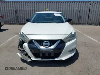 2016 Nissan Maxima SV with VIN 1N4AA6AP6GC903638, listed as a IAAI auction lot 42180421 with 124,586 mi miles and . Bid and sale history available at DreamBid. Image 12.