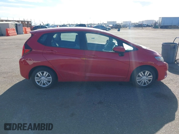 2015 Honda Fit LX with VIN 3HGGK5H50FM735459, listed as a IAAI auction lot 41715199 with 91,779 mi miles. Bid and sale history available at carsss.com. Image 13.