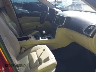 2014 Jeep Grand Cherokee Limited z VIN 1C4RJFBG4EC447633, wystawiony jako IAAI lot #41688829 z przebiegiem 109 472 mil mil oraz . Historia ofert i sprzedaży dostępna na DreamBid. Obrazek 5.