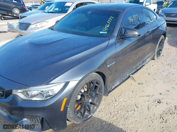 2015 BMW M4 with VIN WBS3R9C57FK334921, listed as a IAAI auction lot 41869773 with 107,058 mi miles. Bid and sale history available at carsss.com. Image 19.