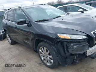 2014 Jeep Cherokee Limited with VIN 1C4PJLDS4EW115066, listed as a IAAI auction lot 41850944 with 125,980 mi miles. Bid and sale history available at carsss.com. Image 14.