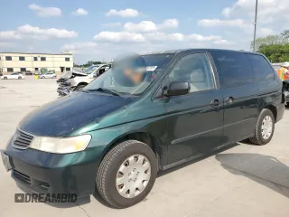 2000 Honda Odyssey LX z VIN 2HKRL1850YH575430, wystawiony jako Copart lot #53260255 z przebiegiem 188 847 mil mil oraz Szkoda całkowita • Salvage title. Historia ofert i sprzedaży dostępna na DreamBid. Obrazek 1.