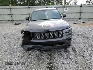 2018 Jeep Grand Cherokee Laredo E с VIN 1C4RJEAG3JC110487, выставлен на аукционе Copart как лот 54700795 с пробегом 135 665 миль миль и Списание • Salvage title. История ставок и продаж доступна на DreamBid. Изображение 14.
