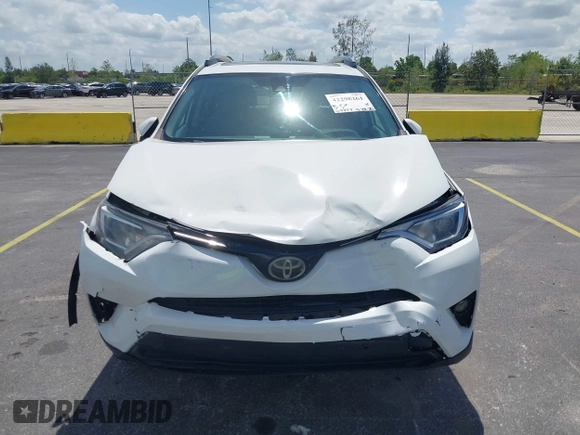 2018 Toyota RAV4 XLE with VIN 2T3WFREV9JW490324, listed as a IAAI auction lot 42298261 with 167,727 mi miles and . Bid and sale history available at DreamBid. Image 6.