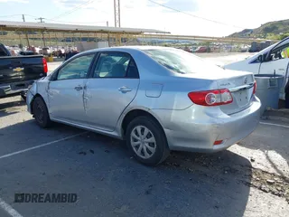 2011 Toyota Corolla L with VIN JTDBU4EE7BJ108265, listed as a IAAI auction lot 41969221 with 104,273 mi miles. Bid and sale history available at carsss.com. Image 3.
