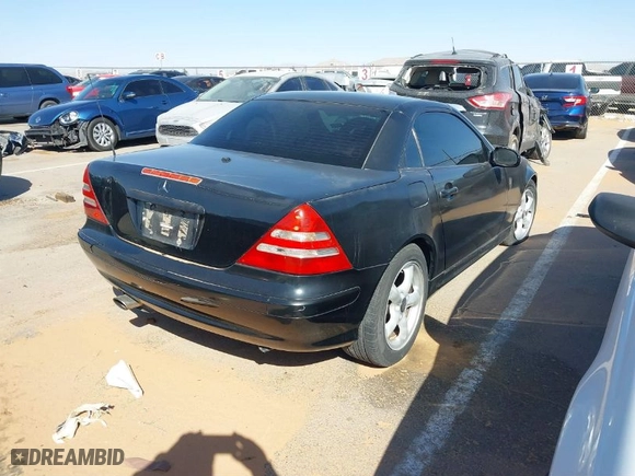2001 Mercedes-Benz SLK-Class with VIN WDBKK65F61F215530, listed as a IAAI auction lot 41669348 with 1 mi miles. Bid and sale history available at carsss.com. Image 4.