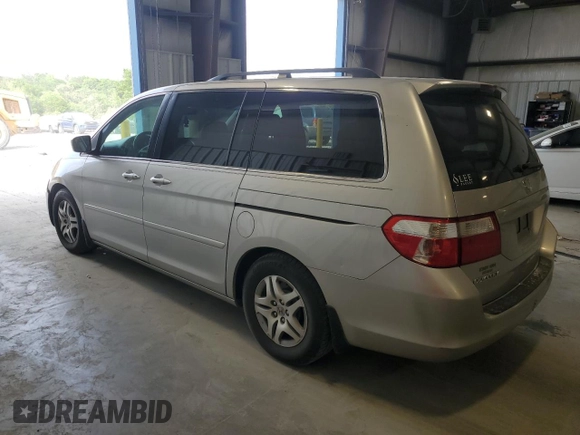 2007 Honda Odyssey EX with VIN 5FNRL38477B429624, listed as a Copart auction lot 53961825 with 144,957 mi miles and Salvage Title. Bid and sale history available at DreamBid. Image 2.
