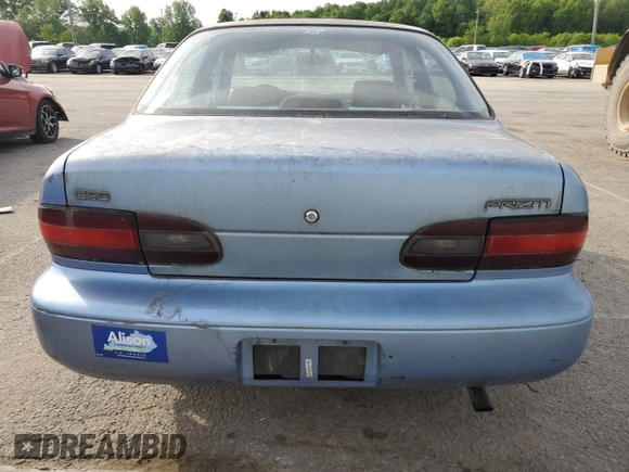 1996 Geo Prizm LSi z VIN 1Y1SK5262TZ041811, wystawiony jako Copart lot #56417875 z przebiegiem 185 771 mil mil oraz Tytuł czysty. Historia ofert i sprzedaży dostępna na DreamBid. Obrazek 6.