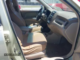 2005 Kia Sportage LX with VIN KNDJF723457060171, listed as a IAAI auction lot 42059269 with 189,461 mi miles and . Bid and sale history available at carsss.com. Image 5.