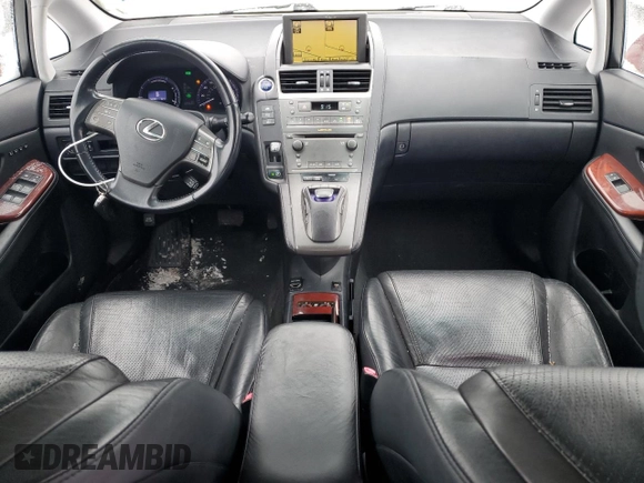 2010 Lexus HS 250h with VIN JTHBB1BA9A2005121, listed as a Copart auction lot 87825175 with 124,594 mi miles and Salvage Title. Bid and sale history available at DreamBid. Image 8.