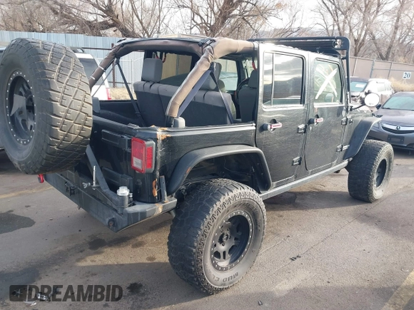 2009 Jeep Wrangler Unlimited Rubicon z VIN 1J4GA69159L749215, wystawiony jako IAAI lot #41489893 z przebiegiem 177 768 mil mil oraz . Historia ofert i sprzedaży dostępna na DreamBid. Obrazek 4.