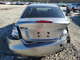 2011 Suzuki Kizashi SE z VIN JS2RE9A30B6110204, wystawiony jako Copart lot #85853384 z przebiegiem 168 962 mil mil oraz Szkoda całkowita • Salvage title. Historia ofert i sprzedaży dostępna na DreamBid. Obrazek 6.