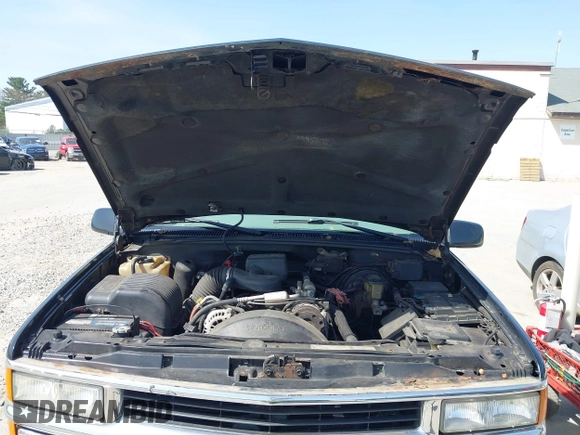 1997 Chevrolet Silverado 1500 with VIN 2GCEK19R3V1159386, listed as a IAAI auction lot 42159684 with 98,577 mi miles and . Bid and sale history available at DreamBid. Image 10.
