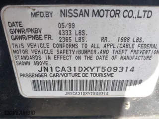 2000 Nissan Maxima GXE with VIN JN1CA31DXYT509314, listed as a IAAI auction lot 41762697 with 282,425 mi miles. Bid and sale history available at carsss.com. Image 9.