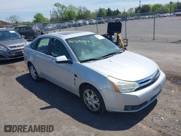 2008 Ford Focus SE with VIN 1FAHP35N88W271973, listed as a IAAI auction lot 42090204 with 261,457 mi miles. Bid and sale history available at carsss.com. Image 1.
