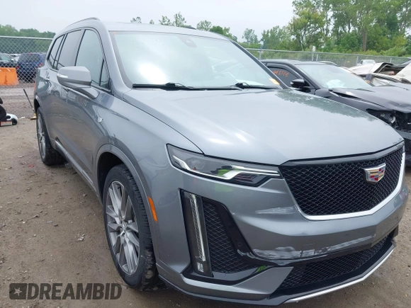 2021 Cadillac XT6 Sport with VIN 1GYKPGRS6MZ128112, listed as a IAAI auction lot 42415342 with 57,680 mi miles and . Bid and sale history available at DreamBid. Image 1.