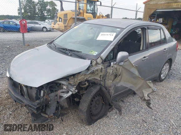 2011 Nissan Versa 1.8 S with VIN 3N1BC1AP3BL359367, listed as a IAAI auction lot 40731117 with 144,660 mi miles. Bid and sale history available at carsss.com. Image 2.