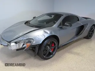 2016 McLaren 650S z VIN SBM11FAA1GW006061, wystawiony jako Copart lot #58605735 z przebiegiem 16 999 mil mil oraz Szkody całkowita. Historia ofert i sprzedaży dostępna na DreamBid. Obrazek 2.