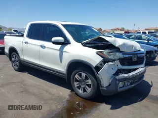 2019 Honda Ridgeline RTL-E with VIN 5FPYK3F74KB009279, listed as a IAAI auction lot 42348773 with 98,141 mi miles and . Bid and sale history available at DreamBid. Image 1.