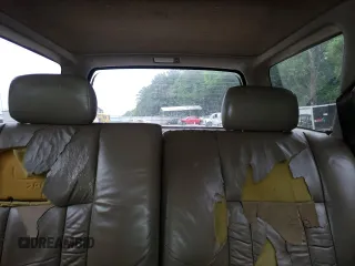 1999 Toyota 4Runner Limited z VIN JT3GN87R1X0100545, wystawiony jako Copart lot #57900635 z przebiegiem 215 408 mil mil oraz Szkoda całkowita • Salvage title. Historia ofert i sprzedaży dostępna na DreamBid. Obrazek 10.