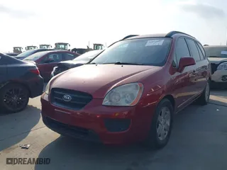 2008 Kia Rondo LX with VIN KNAFG526887128782, listed as a IAAI auction lot 42072865 with 125,882 mi miles. Bid and sale history available at carsss.com. Image 2.