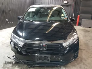 2021 Honda Odyssey Touring with VIN 5FNRL6H83MB040138, listed as a IAAI auction lot 39150096 with 61,322 mi miles and . Bid and sale history available at DreamBid. Image 12.