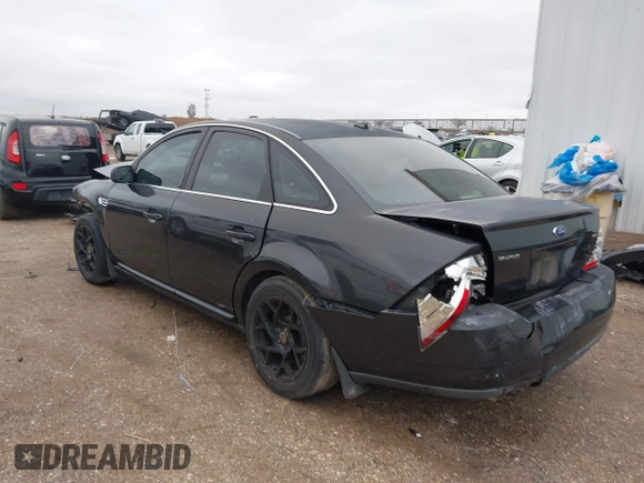 2008 Ford Taurus SEL with VIN 1FAHP24W28G108122, listed as a IAAI auction lot 41546652 with 219,774 mi miles. Bid and sale history available at carsss.com. Image 3.
