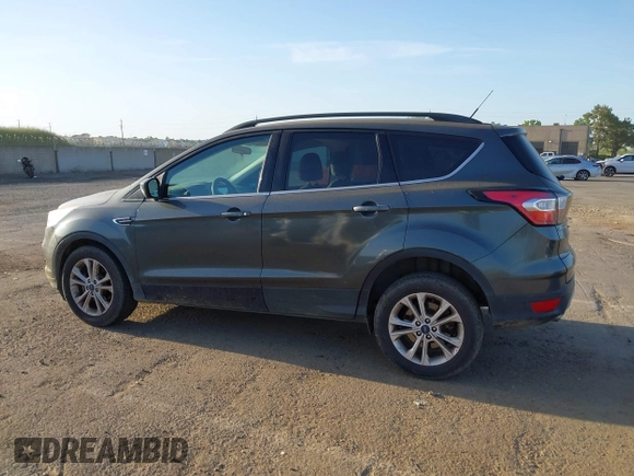 2017 Ford Escape SE with VIN 1FMCU0GD1HUE75697, listed as a IAAI auction lot 42077385 with 160,634 mi miles and . Bid and sale history available at DreamBid. Image 14.