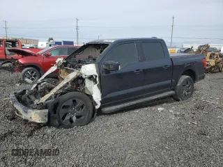 2023 Ford F-150 Lightning Pro with VIN 1FTVW1EVXPWG06881, listed as a Copart auction lot 48709235 with 0 mi miles and Salvage Title. Bid and sale history available at carsss.com. Image 1.