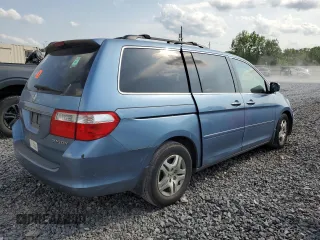 2005 Honda Odyssey EX-L z VIN 5FNRL38685B092279, wystawiony jako Copart lot #57452175 z przebiegiem Nie podano mil oraz Szkoda całkowita • Salvage title. Historia ofert i sprzedaży dostępna na DreamBid. Obrazek 3.