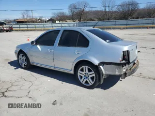 2004 Volkswagen Jetta GL z VIN 3VWRR69M74M128774, wystawiony jako Copart lot #46566225 z przebiegiem 539 544 mil mil oraz Szkoda całkowita • Salvage title. Historia ofert i sprzedaży dostępna na DreamBid. Obrazek 2.